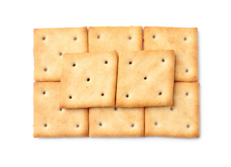 Tasty crispy square crackers isolated on white, top view