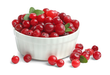Bowl of fresh ripe cranberries with leaves isolated on white