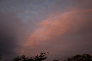 Sunset rainbow and clouds