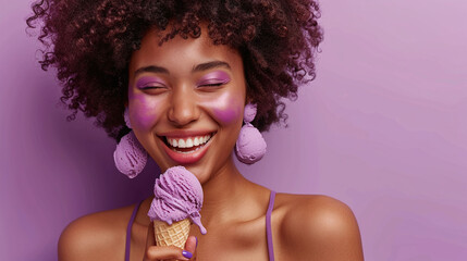 Woman with curly hair eating lavender ice cream cone. Studio portrait with purple background....