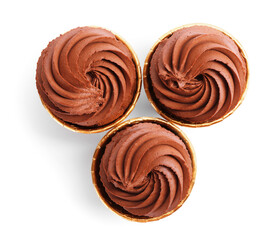Delicious chocolate cupcakes isolated on white, top view