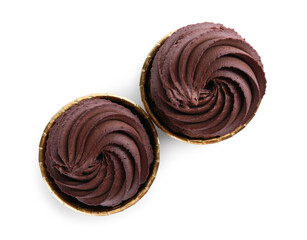 Delicious chocolate cupcakes isolated on white, top view