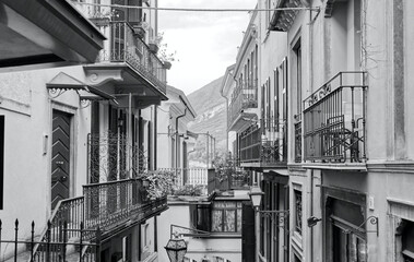 Old street in Bellagio on Lake Como in northern Italy in Europe in black and white - 786282639