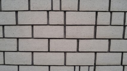 Gray brick wall texture background. Gray brick wall background. Grey brick wall texture.