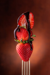 strawberries with melted dripping chocolate. Still life