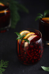 Pomegranate and orange cocktail with mint	