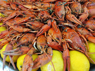 Red boiled crayfish with yellow lemons