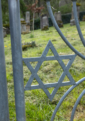 Gate with davidstar at at historical and abandoned Jewish cemetry at Lösnich Graveyard with gate with Davidstar. Rhineland-Palatinate. River Moselle area.