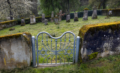 Gate with davidstar at at historical and abandoned Jewish cemetry at Lösnich Graveyard with gate with Davidstar. Rhineland-Palatinate. River Moselle area.