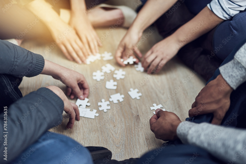 Poster People, teamwork and hands with puzzle on table for problem solving, interaction and support in strategy. Diversity, team and training with jigsaw for creative integration, learning and collaboration
