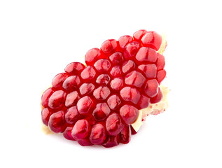 Cut the pomegranate   isolated on white background.