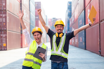 Portrait of an engineer checking products at an industrial container yard.