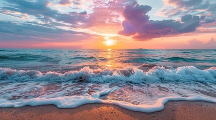 Serene sunrise at tranquil beach with gentle waves - obrazy, fototapety, plakaty