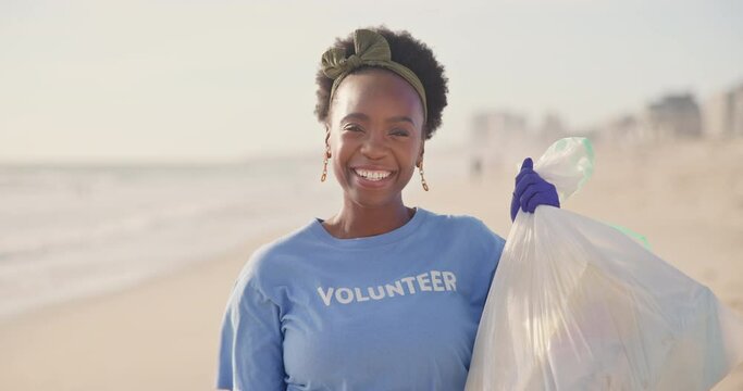 Beach, face or black woman face with plastic bag for earth day, sustainability or sea cleaning project. Recycle, environment or volunteer at sea for the Netherlands for NGO, accountability or charity