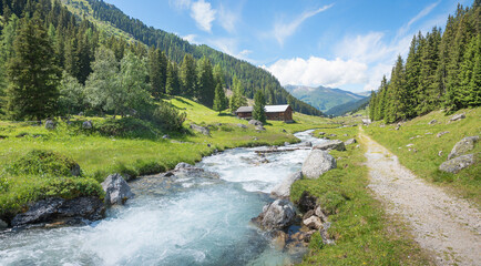 hiking route along the Dischmabach stream, Dischma valley near Davos, switzerland