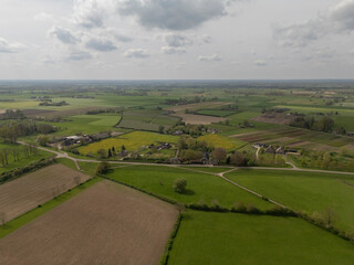 Aerial View: Countryside Road along the IJssel River Dike in Netherlands