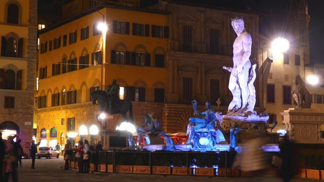 FLORENCE, ITALY - NOVEMBER 23 2016: Fountain of Neptune is fountain, situated on Piazza Signoria (Signoria square), in front of Palazzo Vecchio. It was commissioned in 1565 from Baccio Bandinelli.