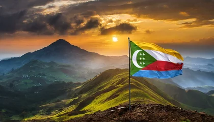 Foto auf Acrylglas The Flag of Comoros On The Mountain. © Daniel