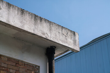 cornice facade of the building with infiltration and erosion of the plaster. the problems of...