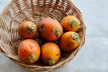 Close-up of ripe Betel nut or Areca nut in wicker basket