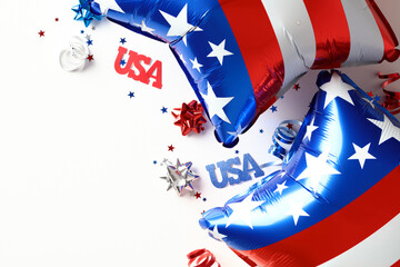 4th of July Independence Day of the USA celebration concept. American balloons and party streamers on white background. Fourth of July banner design.