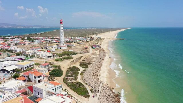 Aerial view of Ilha do Farol lighthouse island located in the Algarve tourist region on Portugal. View of the Ria Formosa.