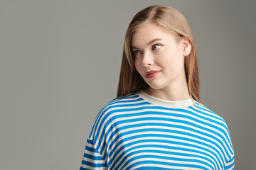 model in striped sweatshirt