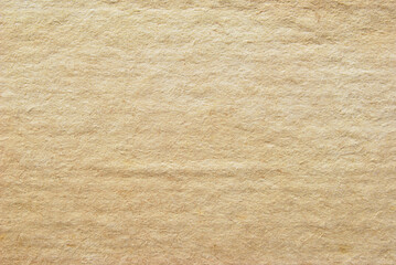 A sheet of recycled creased cardboard texture as background