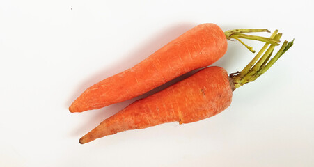 Fresh carrot vegetable on isolated white background. Healthy to cunsume as fresh vegetables and juice.