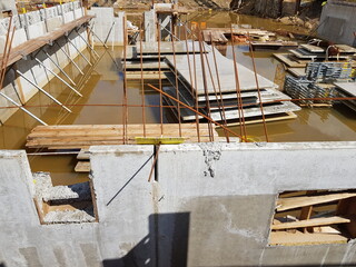 Due to heavy rainfall in recent months, the construction site for new apartments has been closed for several months. Hanover, Germany in mid-April 2024.