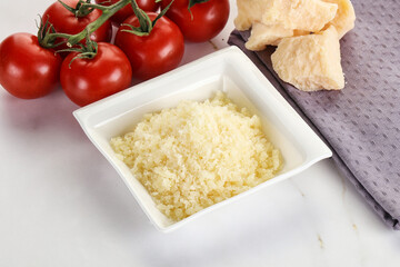 Shredded Italian hard parmesan cheese