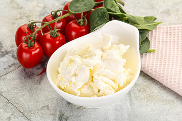 Soft cream cheese in the bowl