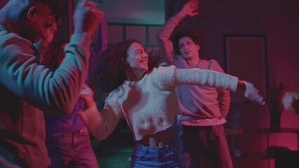 Carefree company moving and entertaining during party