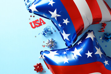 USA Independence Day 4th of July banner template. Flat lay American balloons and party streamers on blue background.
