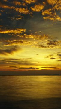 Beautiful landscape with tropical sea sunset on the beach, timelapse. Vertical video 4k