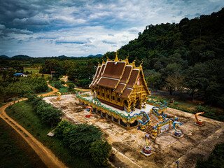 Chachoengsao, Thailand, 28 July 2023. Wat Khao Tham Raet, Temple with a weathered stone exterior,...