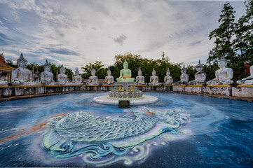 Chachoengsao, Thailand, 08 July 2023. Wat Pa Phromyan. Statue of Buddha seated on a lotus pedestal...