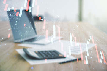 Double exposure of abstract virtual global crisis chart and world map hologram on blurry calculator with laptop background. Financial crisis and recession concept
