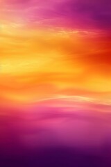 Obraz premium A blurred background features a gradient of orange, purple, and yellow tones, suitable for design.