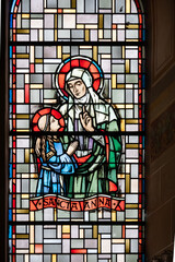 Saint Anne (the Mother of the Virgin Mary). A stained-glass window in Église de la Sainte-Trinité (Holy Trinity Church) in Walferdange.