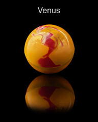 Model of Venus on black background