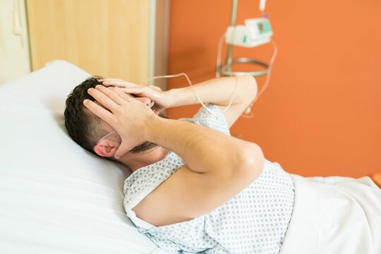Sad Unwell Patient Feeling Depressed While Lying Bed Hospital