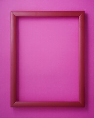 Red picture frame on pink background