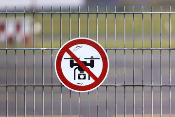 A drone flying prohibited sign at an airport