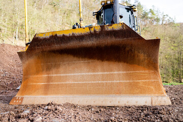 an bulldozer on a construction site