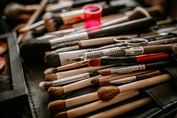 Valmiera, Latvia- July 28, 2024 - A variety of makeup brushes and tools displayed, some with...