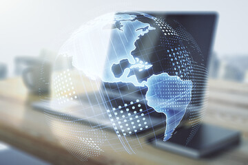 Double exposure of digital America map and modern desktop with laptop on background, research and...