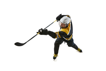 Top view of man, hockey player in motion with stick, training, playing isolated on white...