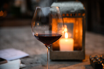 glass of red wine on table