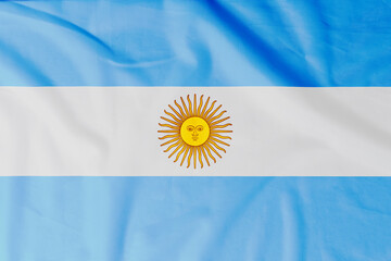 Flag of Argentina with natural material creases as a background